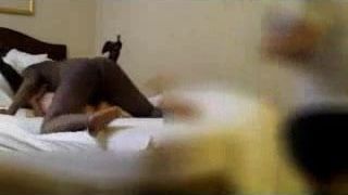 Husband films wife with black bull