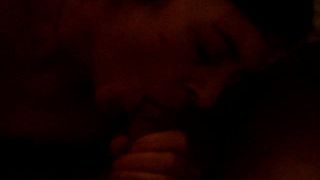 Mature wife sucking cock in darkened room