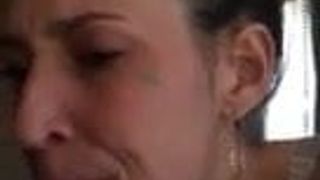 Slut wearing just a bra gags when he cums in her mouth