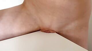 Rubbing pussy against the table corner, pussy juice juice made it slimy. Humping corner orgasm